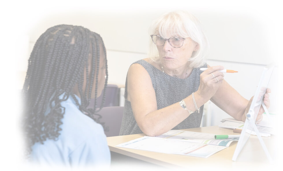 A YoungEducation SEN tutor working one-to-one with a student